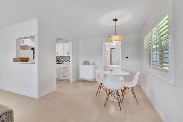 dining room with light tile patterned floors