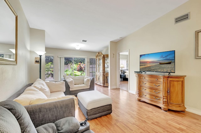 living room with hardwood / wood-style floors