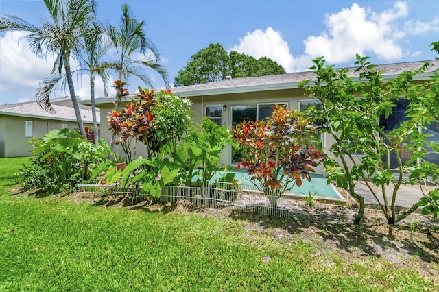 exterior space with a yard