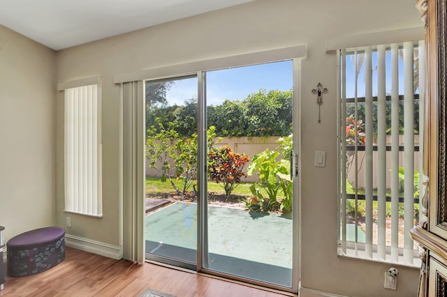 doorway featuring light hardwood / wood-style floors