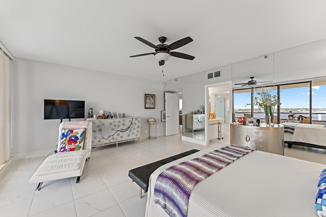 bedroom with light tile patterned floors and ceiling fan