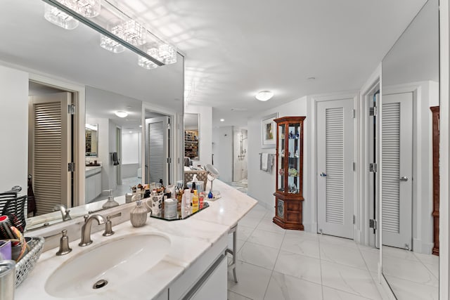 bathroom featuring vanity and tile patterned flooring