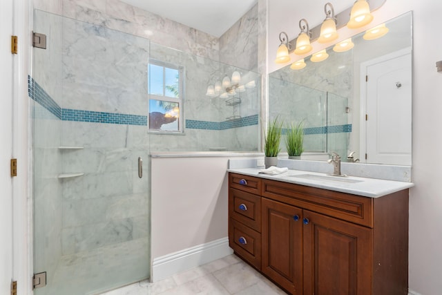 bathroom featuring vanity and a shower with door