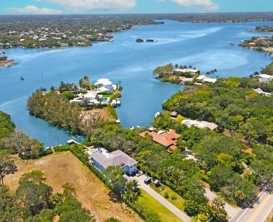 bird's eye view with a water view