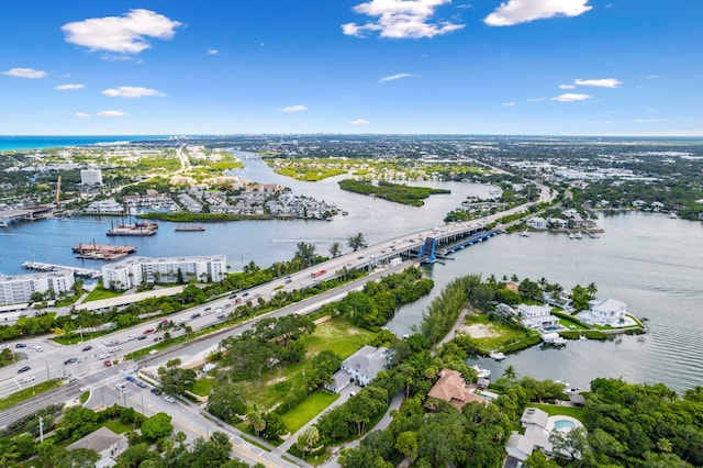 birds eye view of property featuring a water view