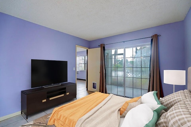 tiled bedroom with a textured ceiling