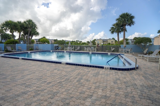 view of pool featuring a patio area