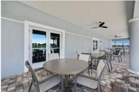 view of patio / terrace featuring ceiling fan