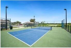 view of sport court with basketball hoop