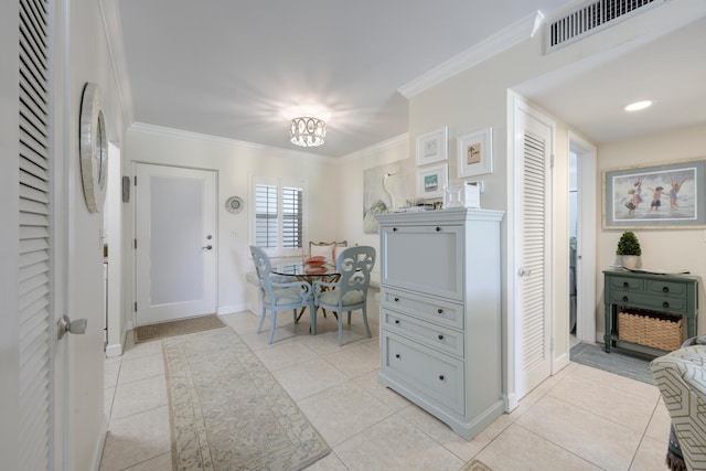 interior space with crown molding and a notable chandelier