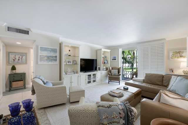 living room with built in features, light tile patterned flooring, and ornamental molding