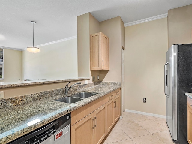 kitchen featuring light brown cabinets, light tile patterned floors, stainless steel appliances, sink, and ornamental molding