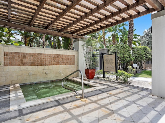 view of patio / terrace featuring a pergola