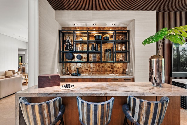 bar with light tile patterned floors