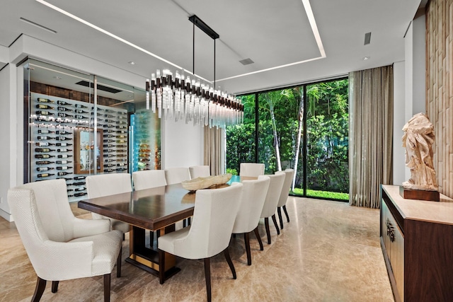 dining area featuring floor to ceiling windows and visible vents