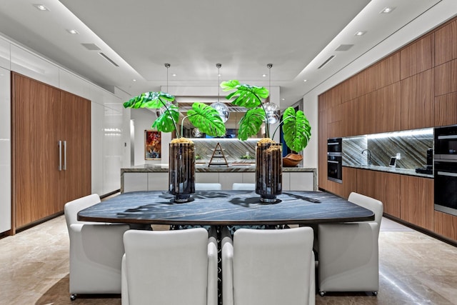 dining room featuring recessed lighting