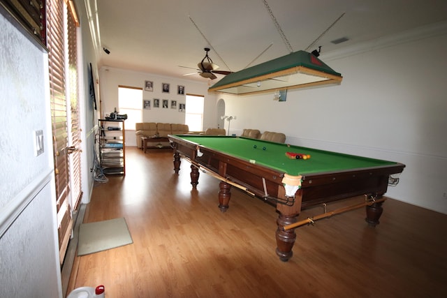 rec room with hardwood / wood-style flooring, crown molding, billiards, and ceiling fan