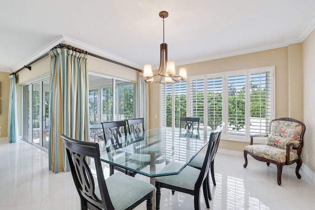 dining room with a notable chandelier, plenty of natural light, and crown molding