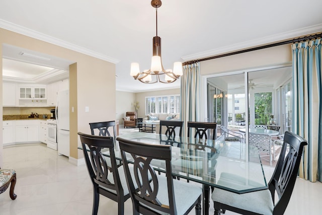 dining space with crown molding and ceiling fan with notable chandelier