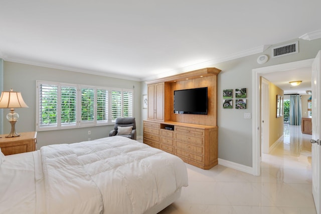 bedroom with crown molding