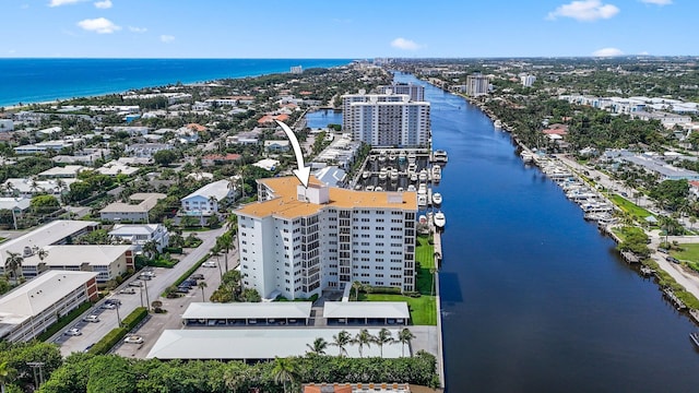 drone / aerial view with a water view