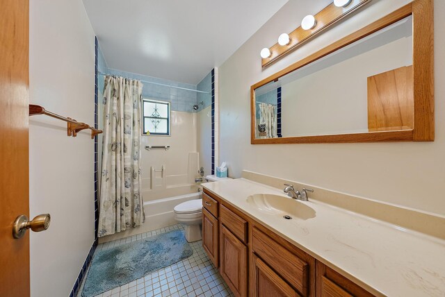 bedroom with a textured ceiling, baseboards, and wood finished floors