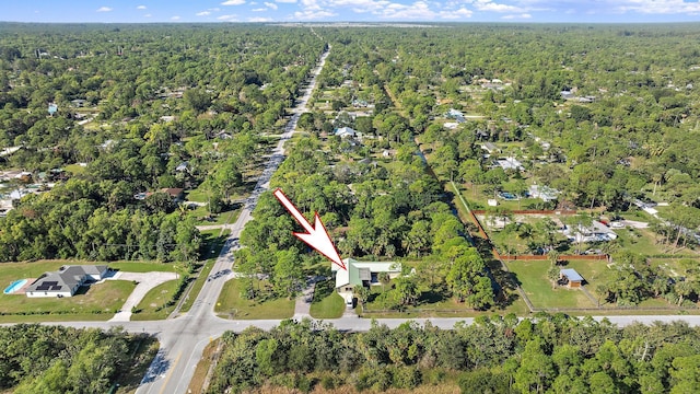 bird's eye view featuring a forest view