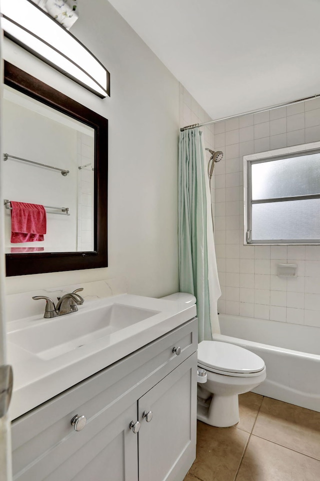 full bathroom with vanity, tile patterned flooring, toilet, and shower / bath combo