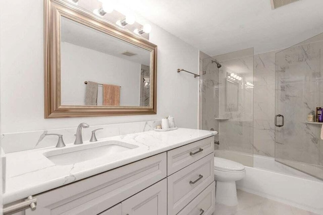 full bathroom with vanity, toilet, and combined bath / shower with glass door