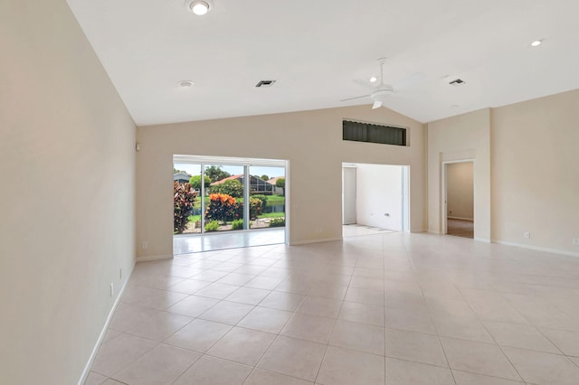 unfurnished room with ceiling fan, light tile patterned flooring, and lofted ceiling