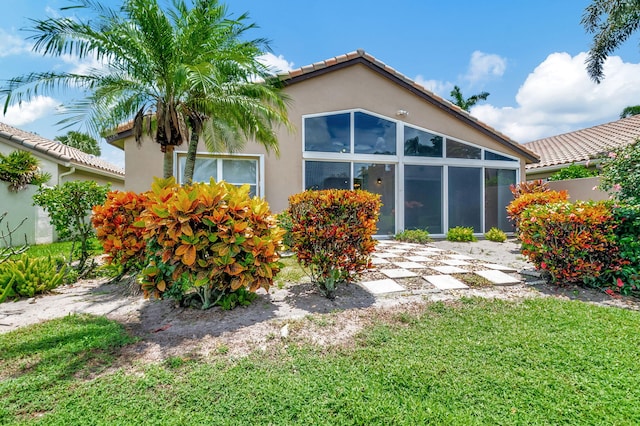 view of home's exterior featuring a lawn