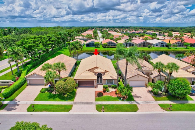 bird's eye view with a water view