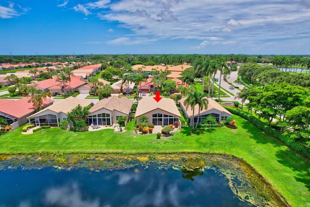 bird's eye view with a water view