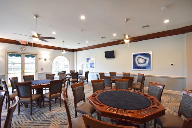 dining room with ceiling fan, french doors, and ornamental molding