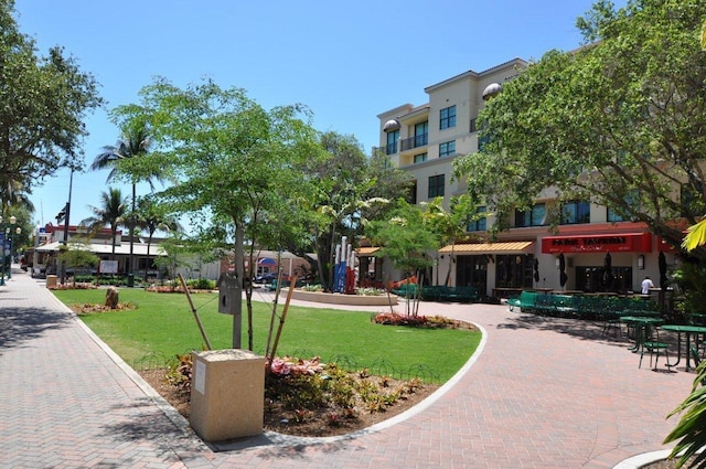 view of community featuring a yard