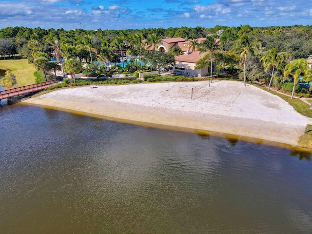 aerial view with a beach view and a water view