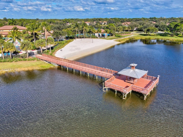 view of dock with a gazebo and a water view