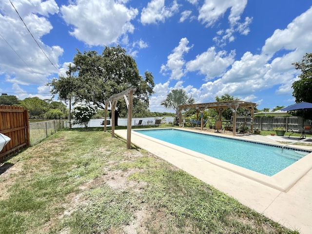 view of pool with a patio, a fenced backyard, a yard, a fenced in pool, and a pergola