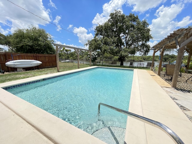 view of pool featuring a fenced in pool, a patio area, a fenced backyard, and a pergola