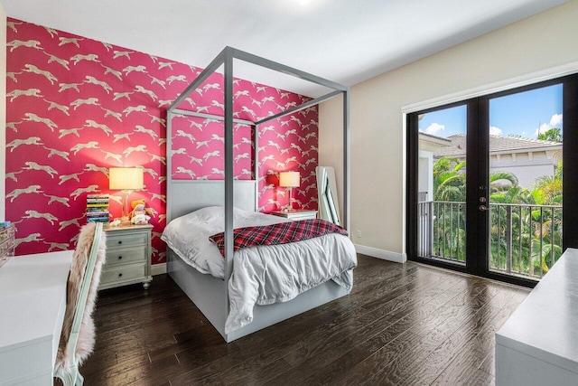 bedroom featuring dark wood-type flooring and access to exterior