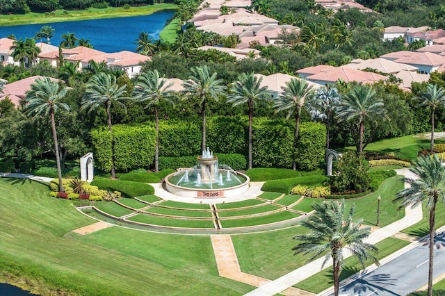 view of home's community with a water view