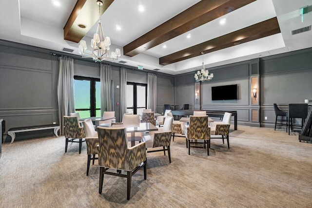 dining space with beam ceiling, light carpet, and an inviting chandelier