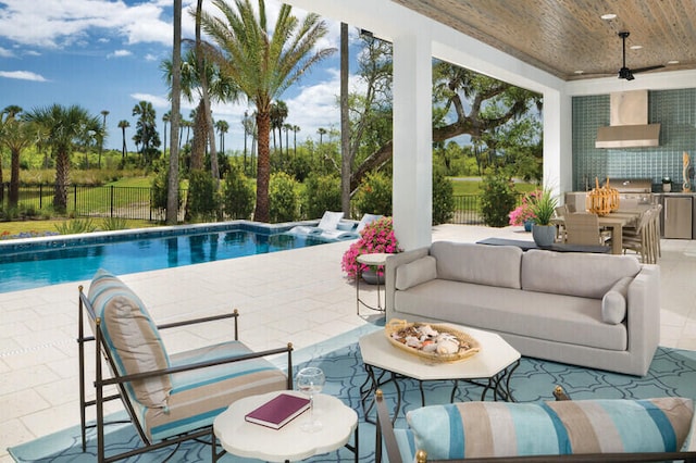 view of swimming pool with outdoor lounge area, area for grilling, ceiling fan, and a patio area