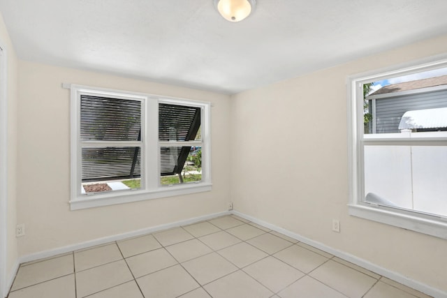 view of tiled spare room