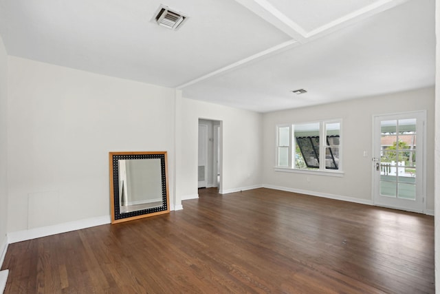 unfurnished living room with dark hardwood / wood-style floors