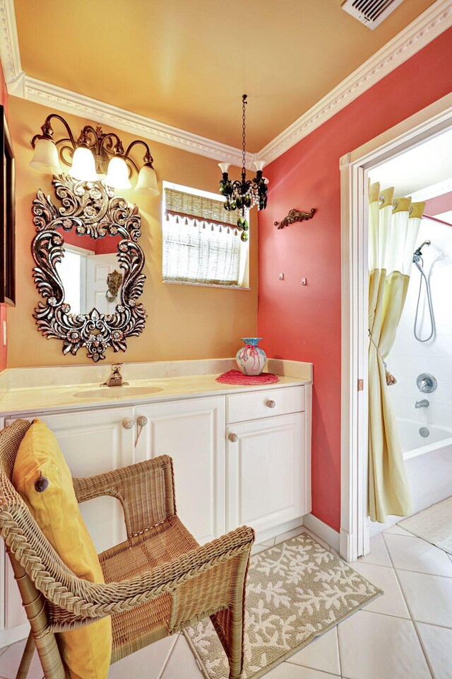 bathroom featuring tile patterned floors, a chandelier, vanity, shower / tub combo, and ornamental molding