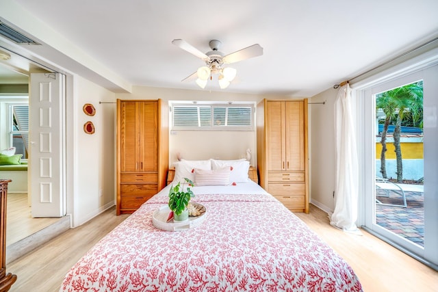 bedroom featuring ceiling fan, light hardwood / wood-style floors, and access to exterior