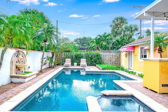 view of swimming pool featuring a patio