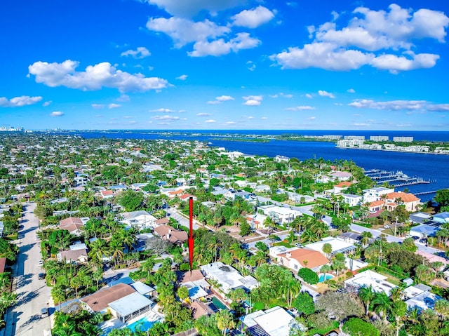 birds eye view of property featuring a water view