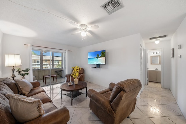 living room featuring ceiling fan